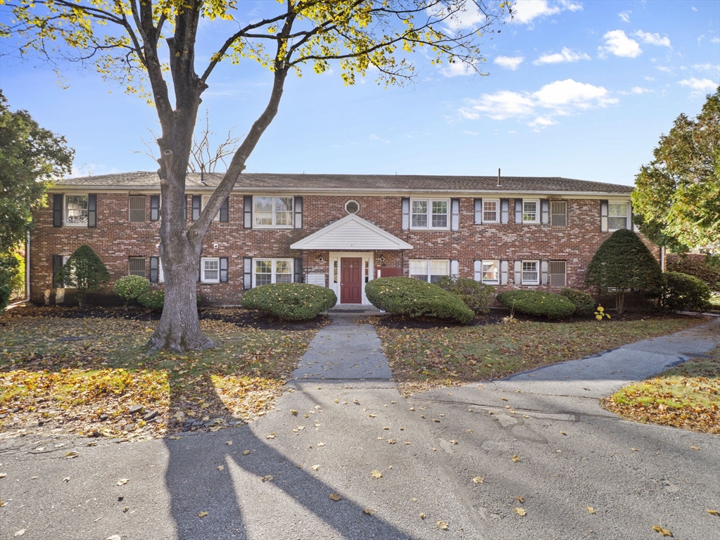 9 Elm Street, Unit 1 Acton, MA 01720 - Photo 28 of 29 a front view of a house with garden