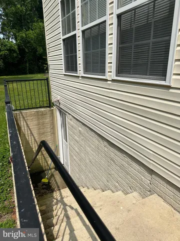 a view of a balcony with a bench