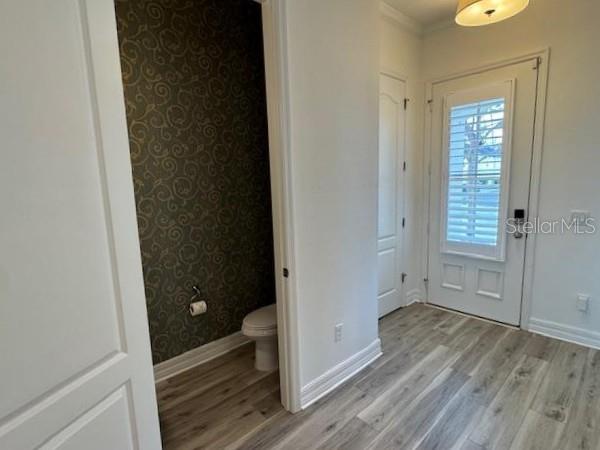 1515 Resolute Street Celebration, FL 34747 - Photo 11 of 39 wooden floor in an empty room