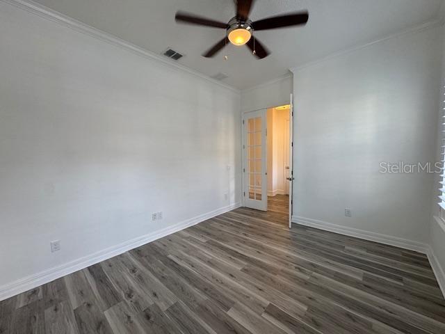 1515 Resolute Street Celebration, FL 34747 - Photo 14 of 39 wooden floor in an empty room