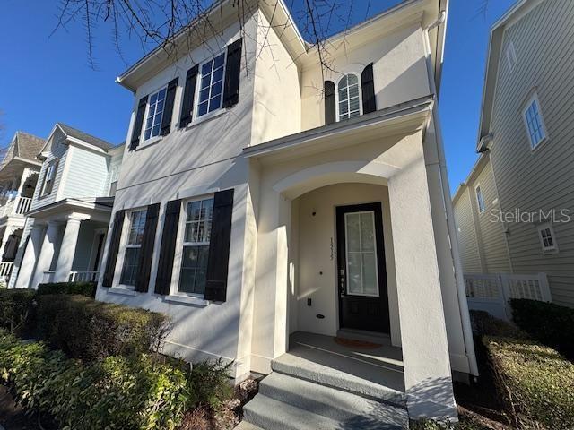 1515 Resolute Street Celebration, FL 34747 - Photo 2 of 39 a view of a house with a door and stairs