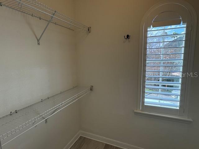 1515 Resolute Street Celebration, FL 34747 - Photo 21 of 39 a view of a small space with racks on the wall