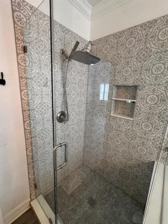 1515 Resolute Street Celebration, FL 34747 - Photo 23 of 39 a bathroom with a shower