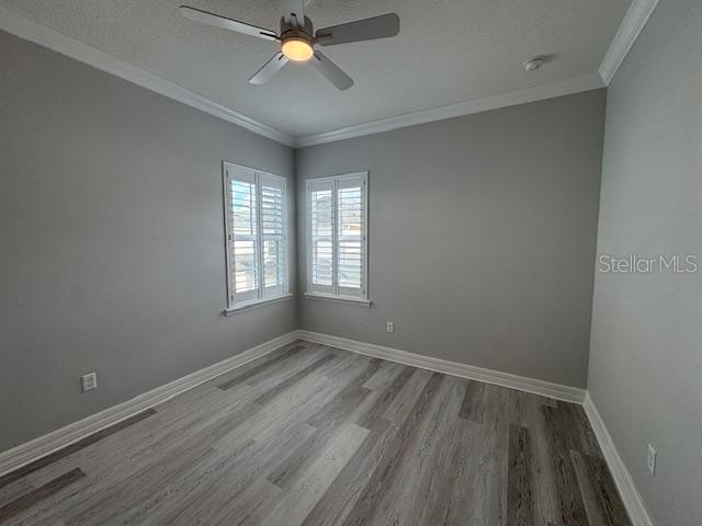 1515 Resolute Street Celebration, FL 34747 - Photo 28 of 39 a view of room with window and hardwood floor