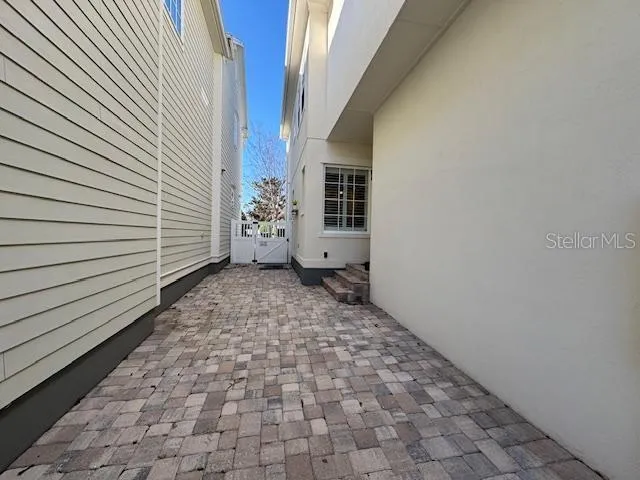a view of a back yard of the house