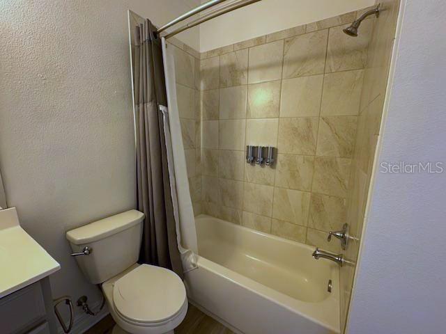 1515 Resolute Street Celebration, FL 34747 - Photo 30 of 39 a white toilet sitting next to a bath tub