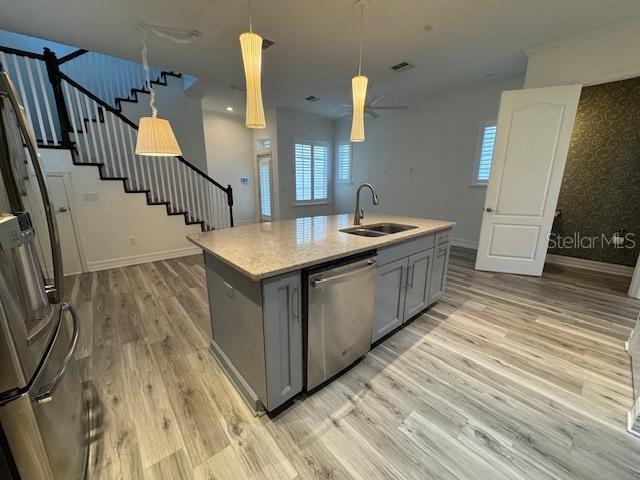 1515 Resolute Street Celebration, FL 34747 - Photo 10 of 39 a utility room with wooden floor washer and dryer