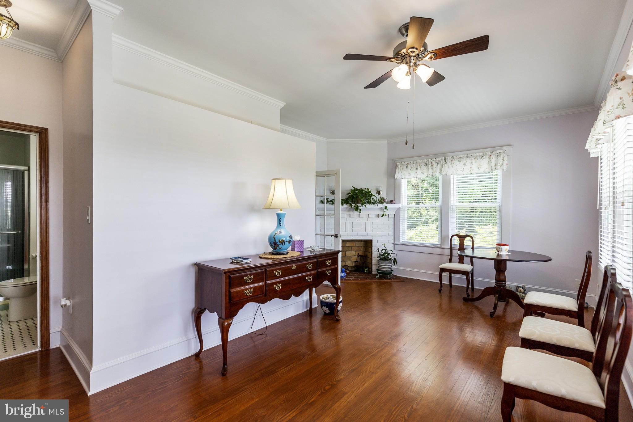 14236 Solomons Island Road South Solomons, MD 20688 - Photo 11 of 40 Sitting area with hardwood floors