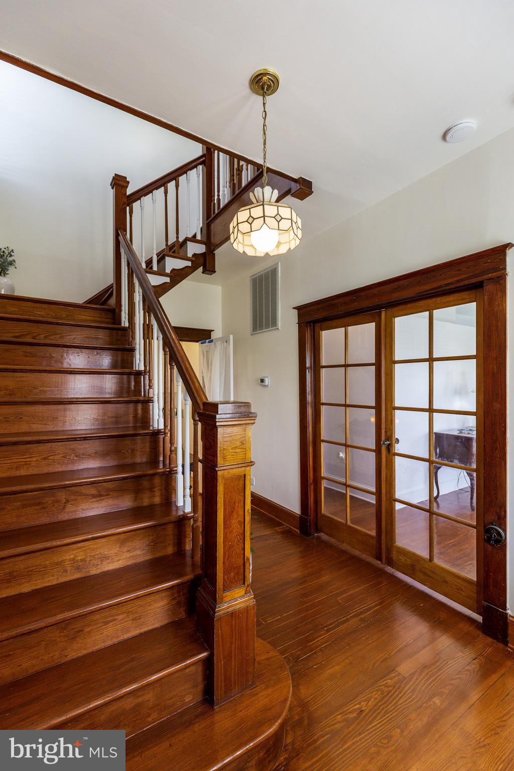 14236 Solomons Island Road South Solomons, MD 20688 - Photo 10 of 40 Entrance hardwood floors through out home