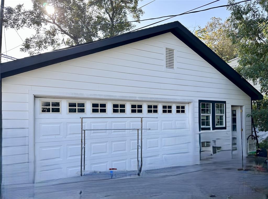 5114 Alcott Street Dallas, TX 75206 - Photo 17 of 24 Oversized 2 car garage. Extra space could be home office