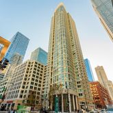 a view of a multi story buildings