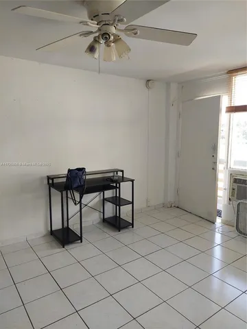 a view of a livingroom with furniture