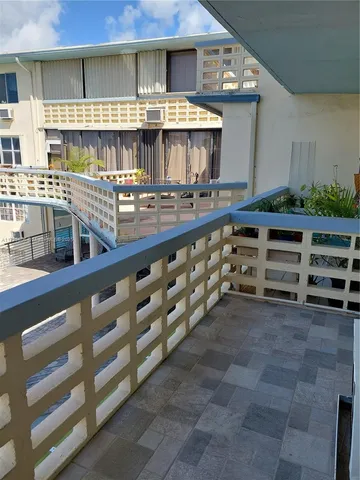 a view of a chair and table in the terrace