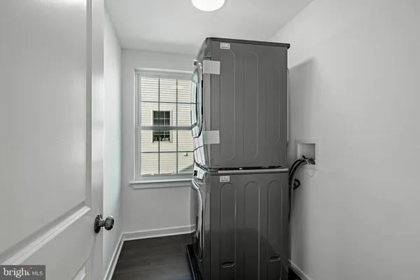 a bathroom with a sink toilet tub and shower