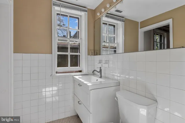 a bathroom with a sink and a toilet