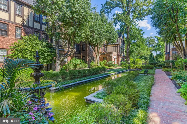 a view of a swimming pool with a garden