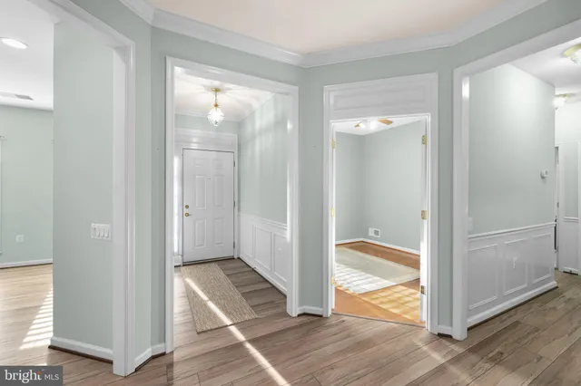 a view of a bathroom with a glass door and a window