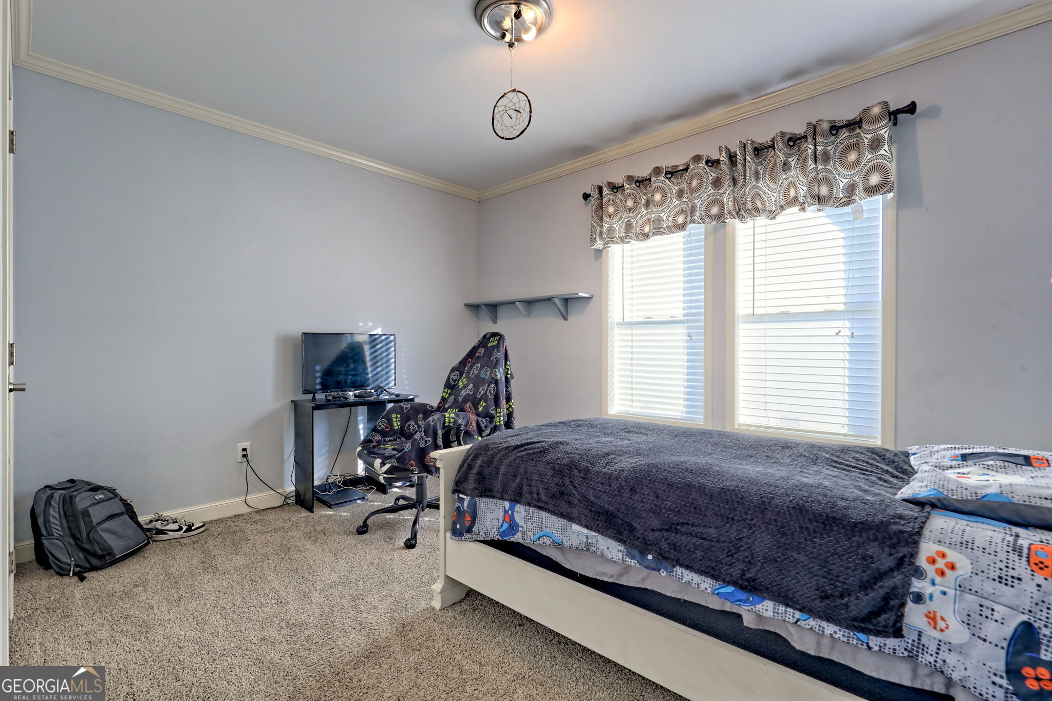 42 Jones Creek Road Blairsville, GA 30512 - Photo 19 of 56 a bedroom with a bed and a window