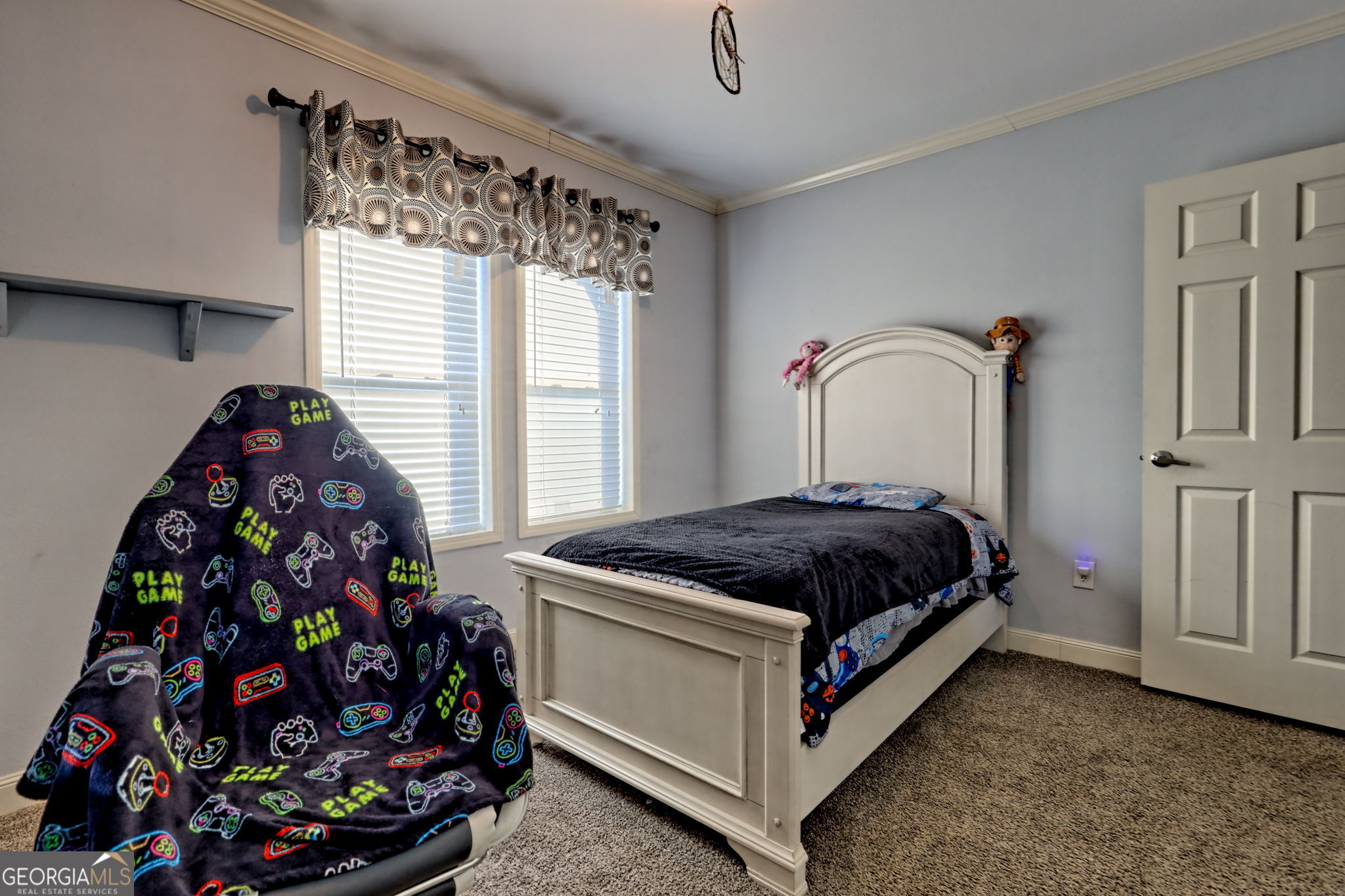42 Jones Creek Road Blairsville, GA 30512 - Photo 20 of 56 a bedroom with a bed and a window
