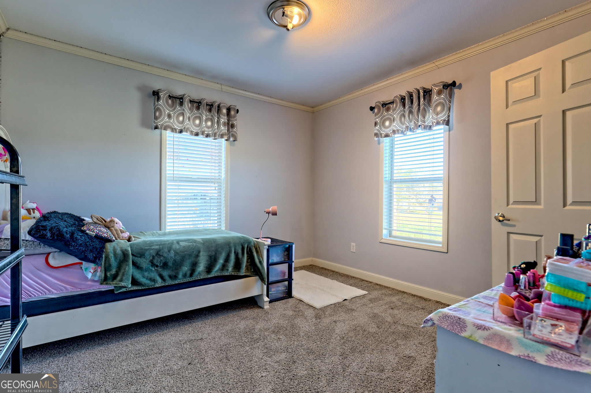 42 Jones Creek Road Blairsville, GA 30512 - Photo 21 of 56 a bed room with a bed and a window