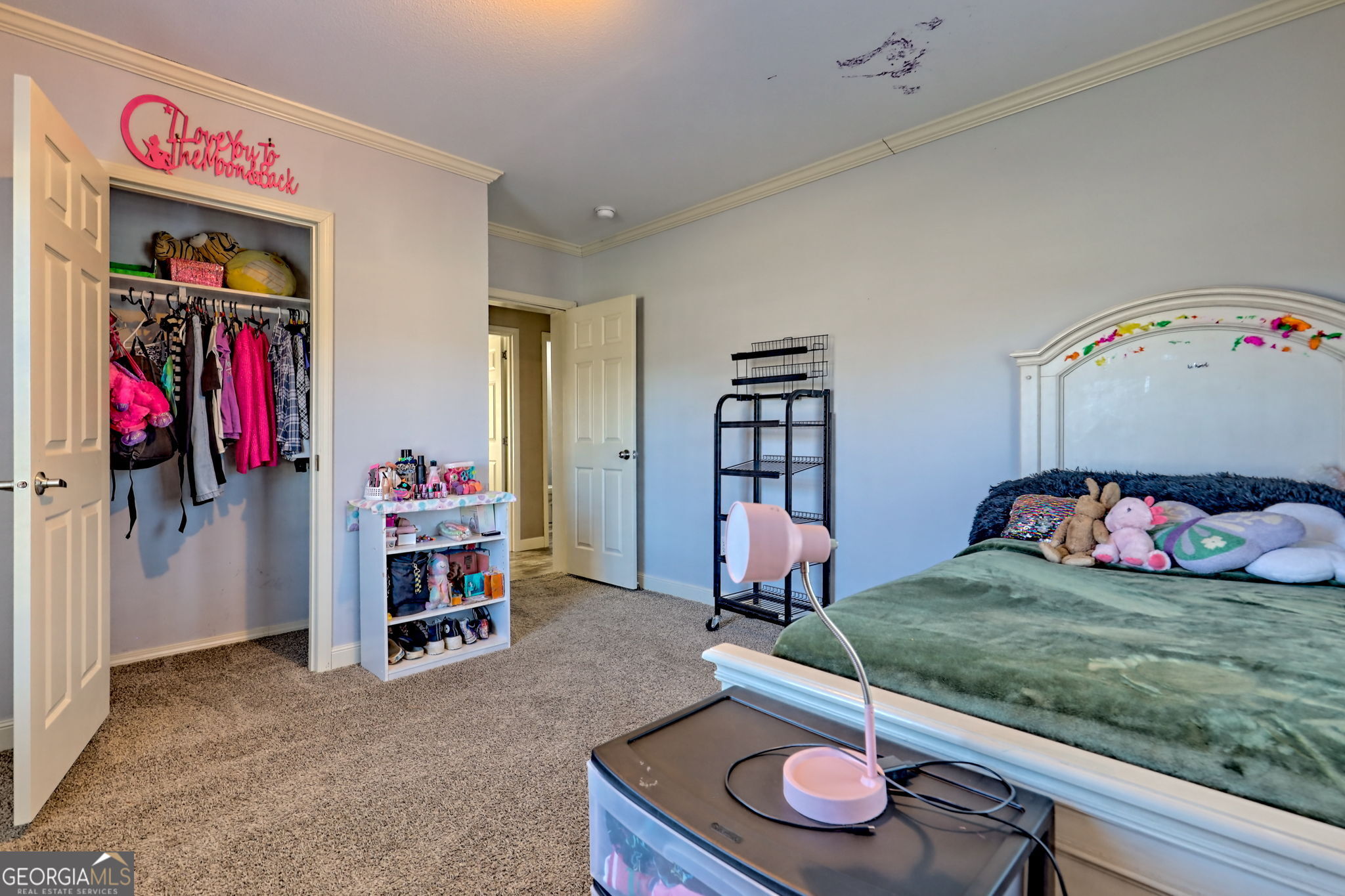 42 Jones Creek Road Blairsville, GA 30512 - Photo 22 of 56 a bedroom with furniture and a book shelf