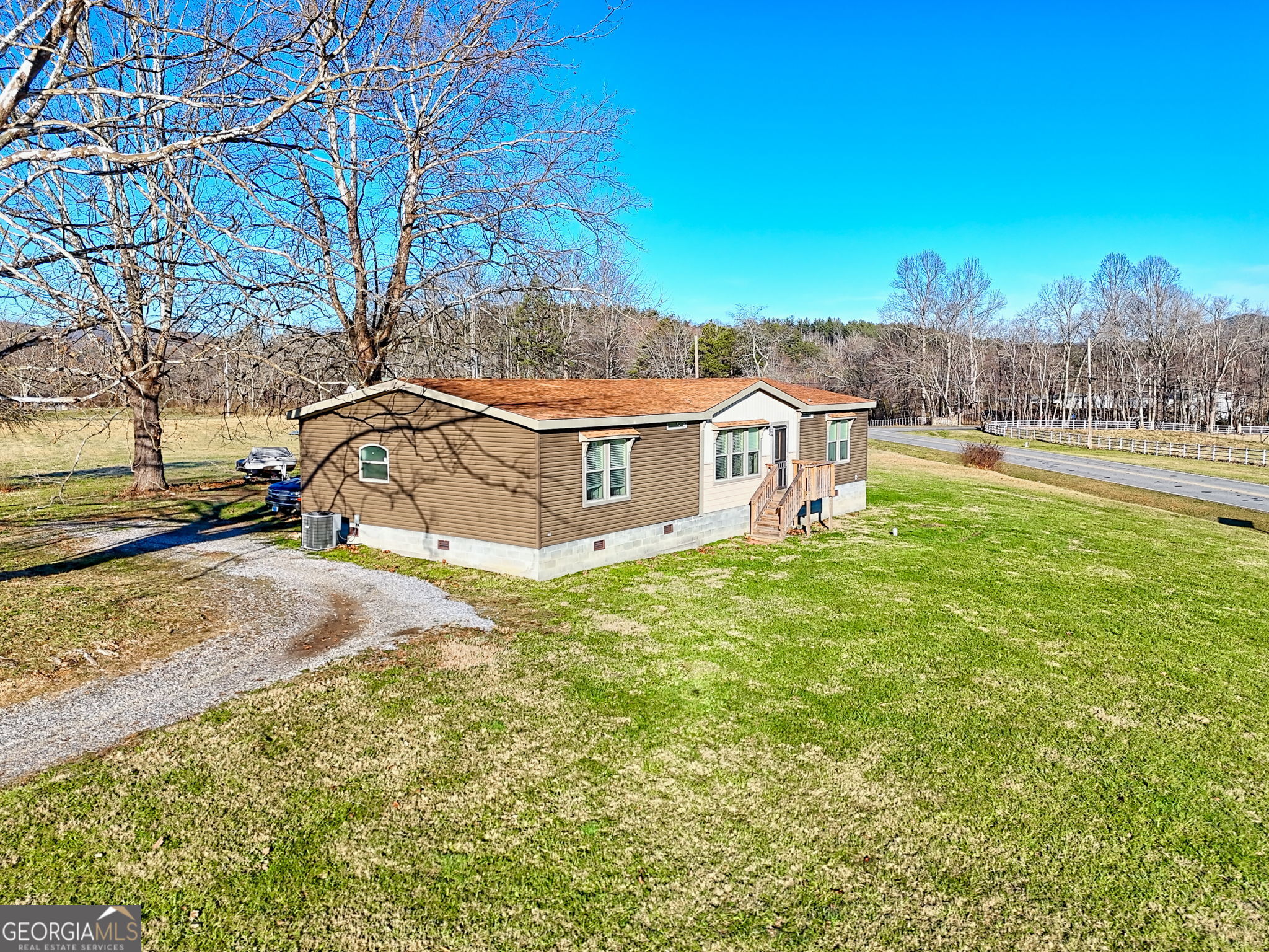 42 Jones Creek Road Blairsville, GA 30512 - Photo 3 of 56 a view of a house with backyard and a tree