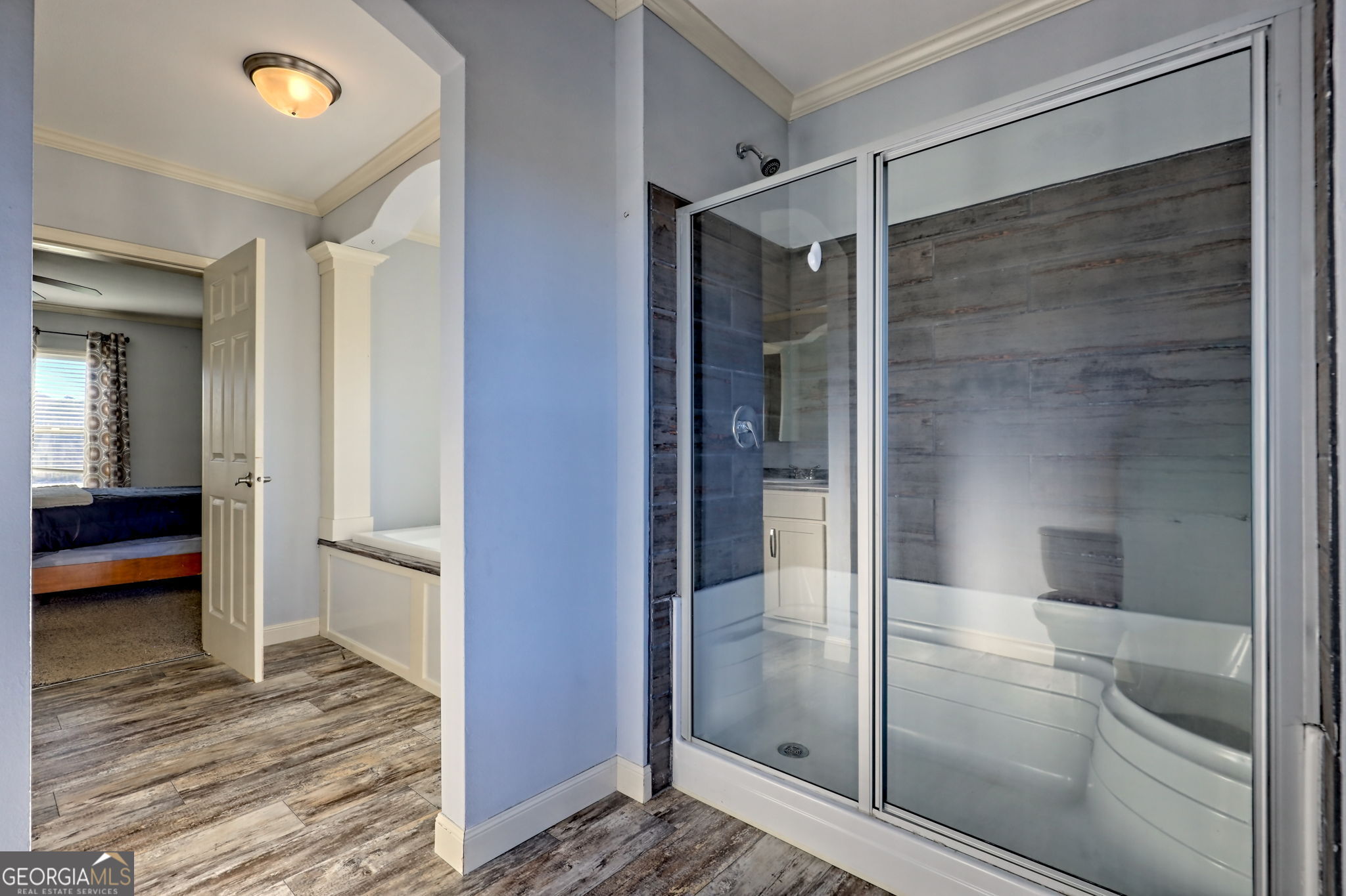 42 Jones Creek Road Blairsville, GA 30512 - Photo 32 of 56 a bathroom with a glass shower door