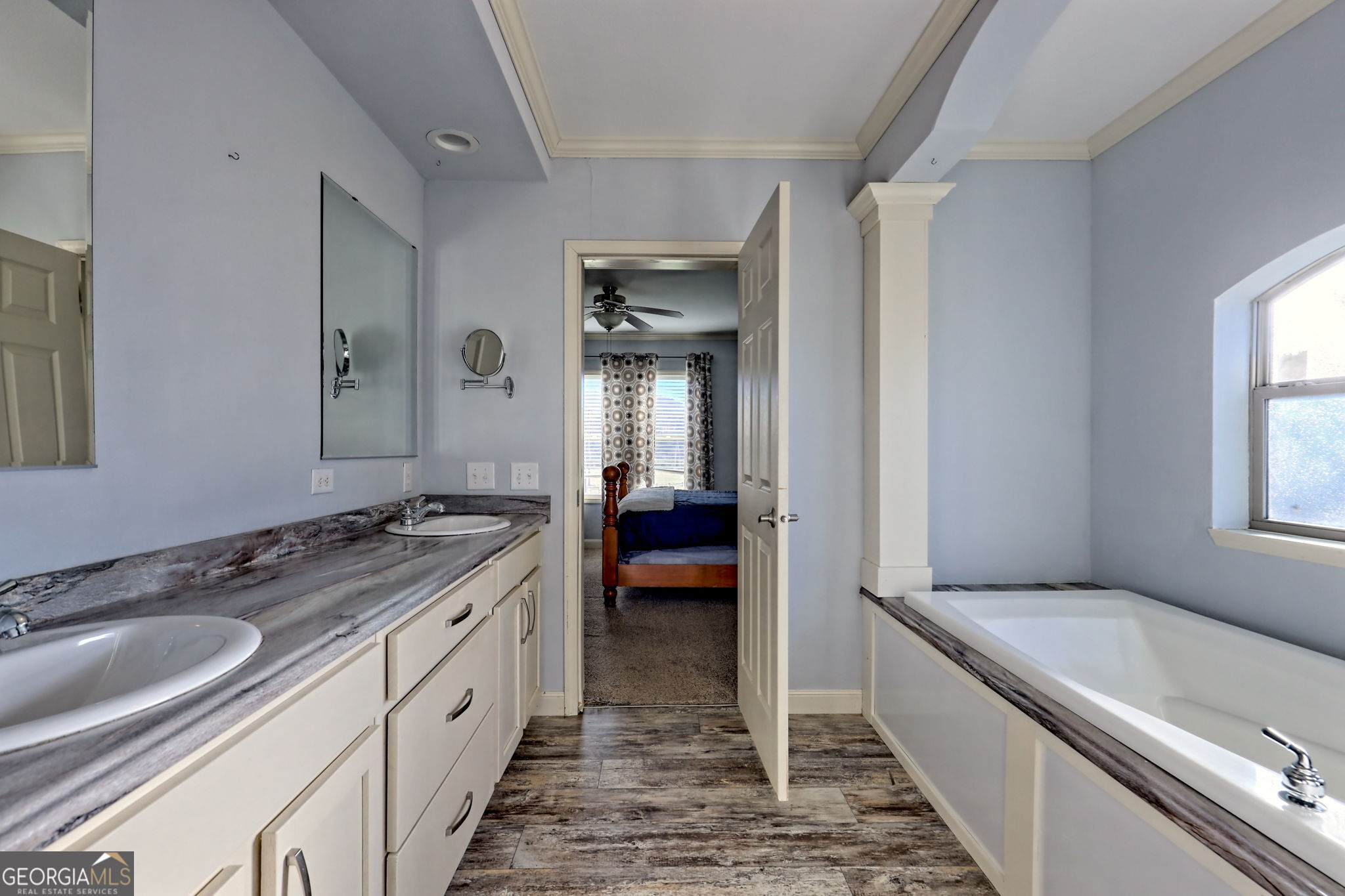 42 Jones Creek Road Blairsville, GA 30512 - Photo 33 of 56 a spacious bathroom with a granite countertop sink mirror and a bathtub