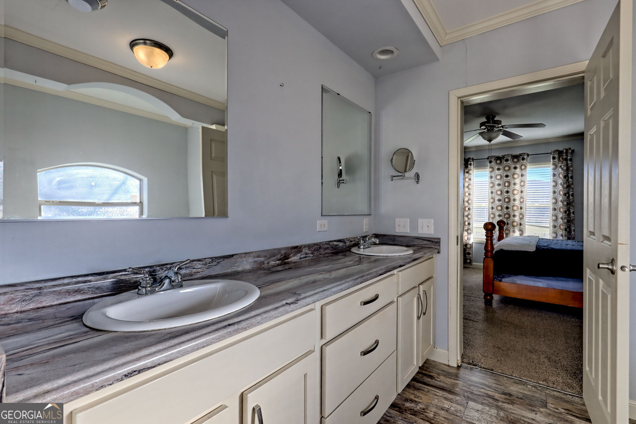 42 Jones Creek Road Blairsville, GA 30512 - Photo 35 of 56 a en suite bathroom with double sink and a mirror