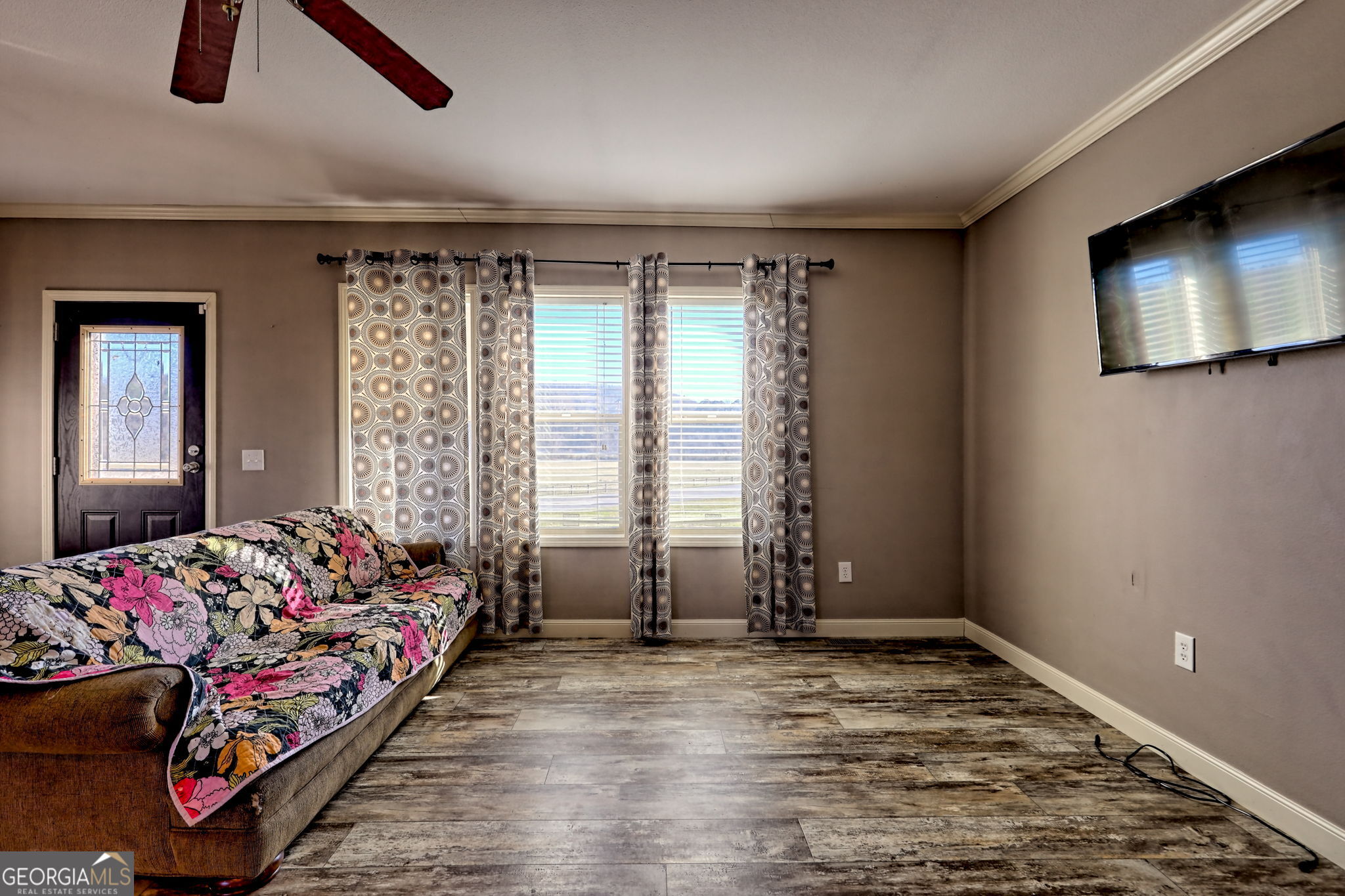 42 Jones Creek Road Blairsville, GA 30512 - Photo 39 of 56 a bedroom with bed and a window