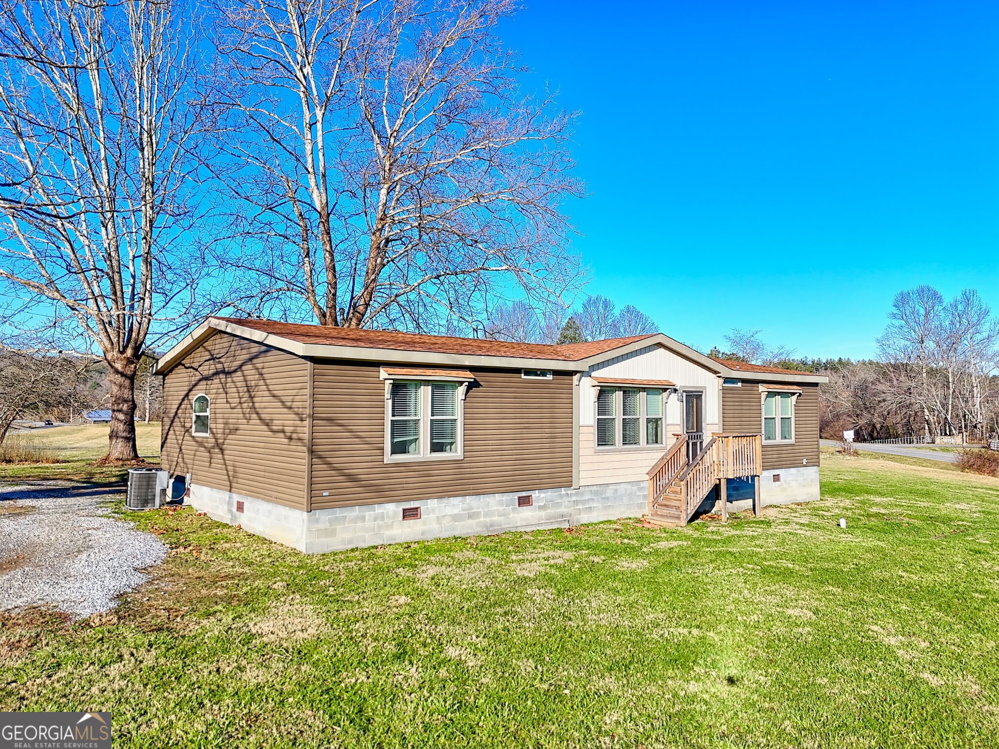 42 Jones Creek Road Blairsville, GA 30512 - Photo 4 of 56 a view of a house with a yard