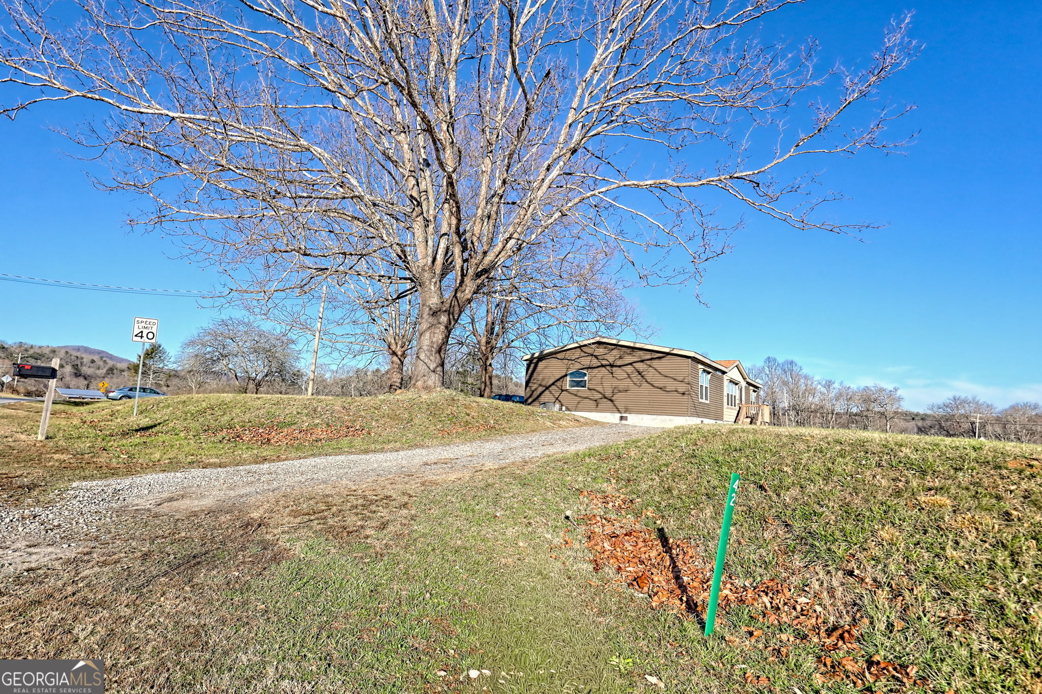 42 Jones Creek Road Blairsville, GA 30512 - Photo 56 of 56 a view of a yard with a house