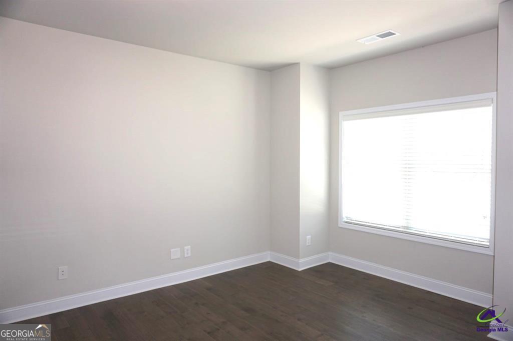 121 Bluecoat Trail Byron, GA 31008 - Photo 40 of 45 an empty room with a window