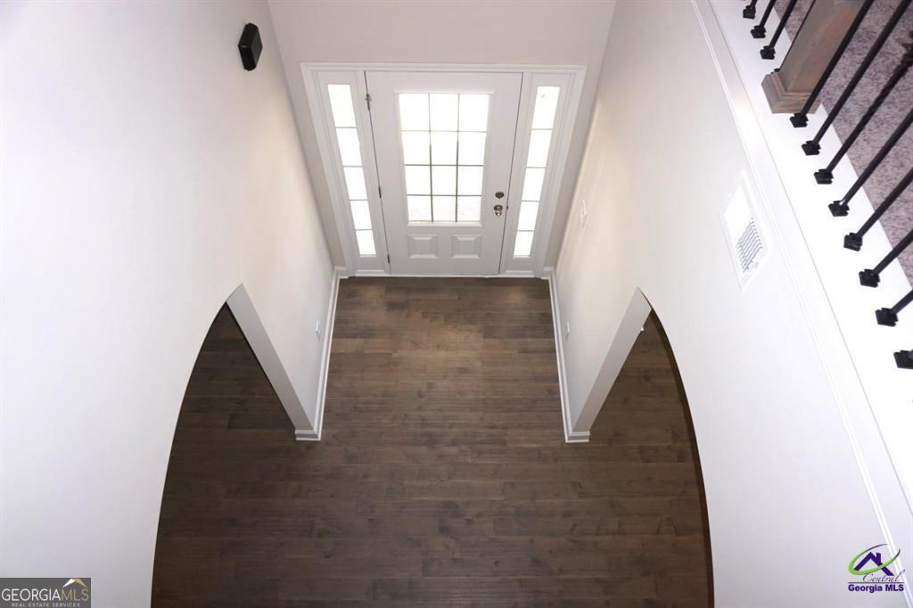 121 Bluecoat Trail Byron, GA 31008 - Photo 45 of 45 a view of a hallway view with floor to ceiling window