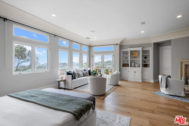 a living room with furniture and window