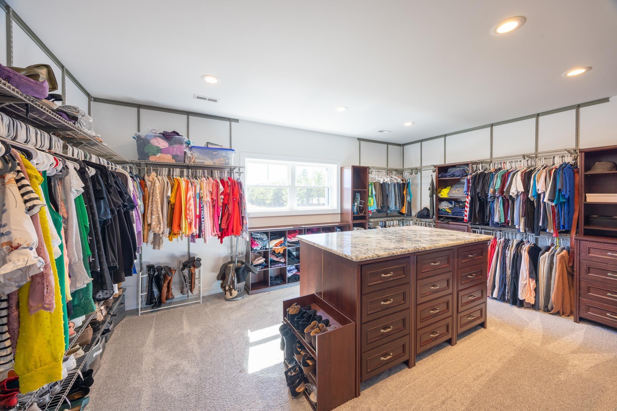 1309 Tyler Road Woodbine, NJ 08270 - Photo 57 of 84 a view of walk in closet with clothes and shoes