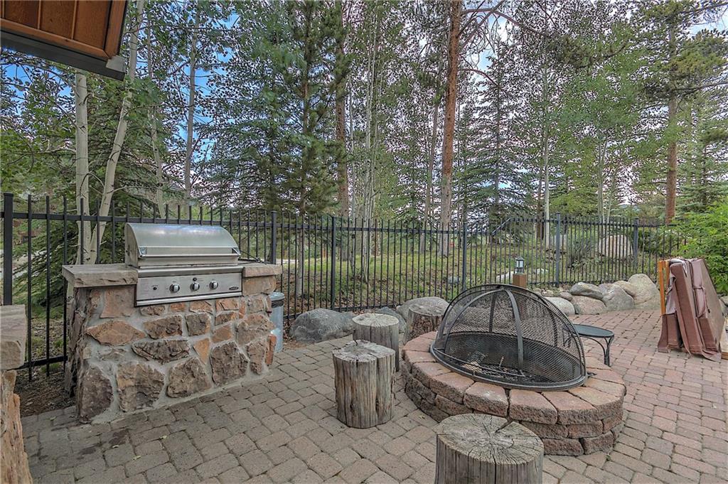 57 Lake Ridge Circle, Unit 1849 Keystone, CO 80435 - Photo 22 of 25 a garden view with a seating space
