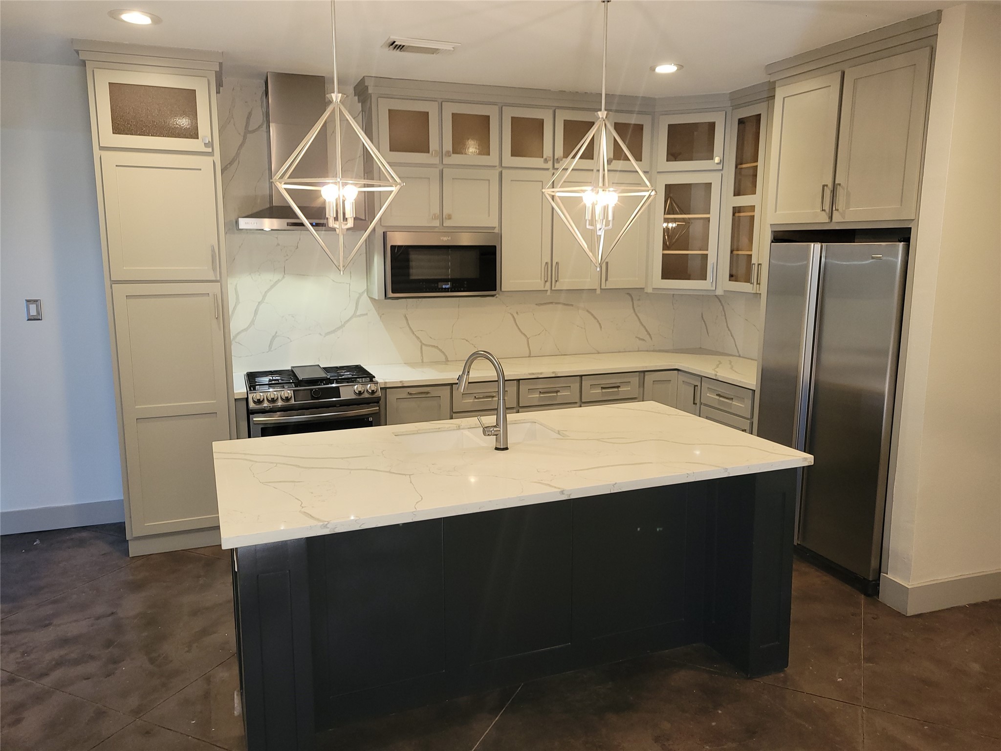 4914 Rose Street Houston, TX 77007 - Photo 1 of 36 a kitchen with stainless steel appliances a sink stove and refrigerator