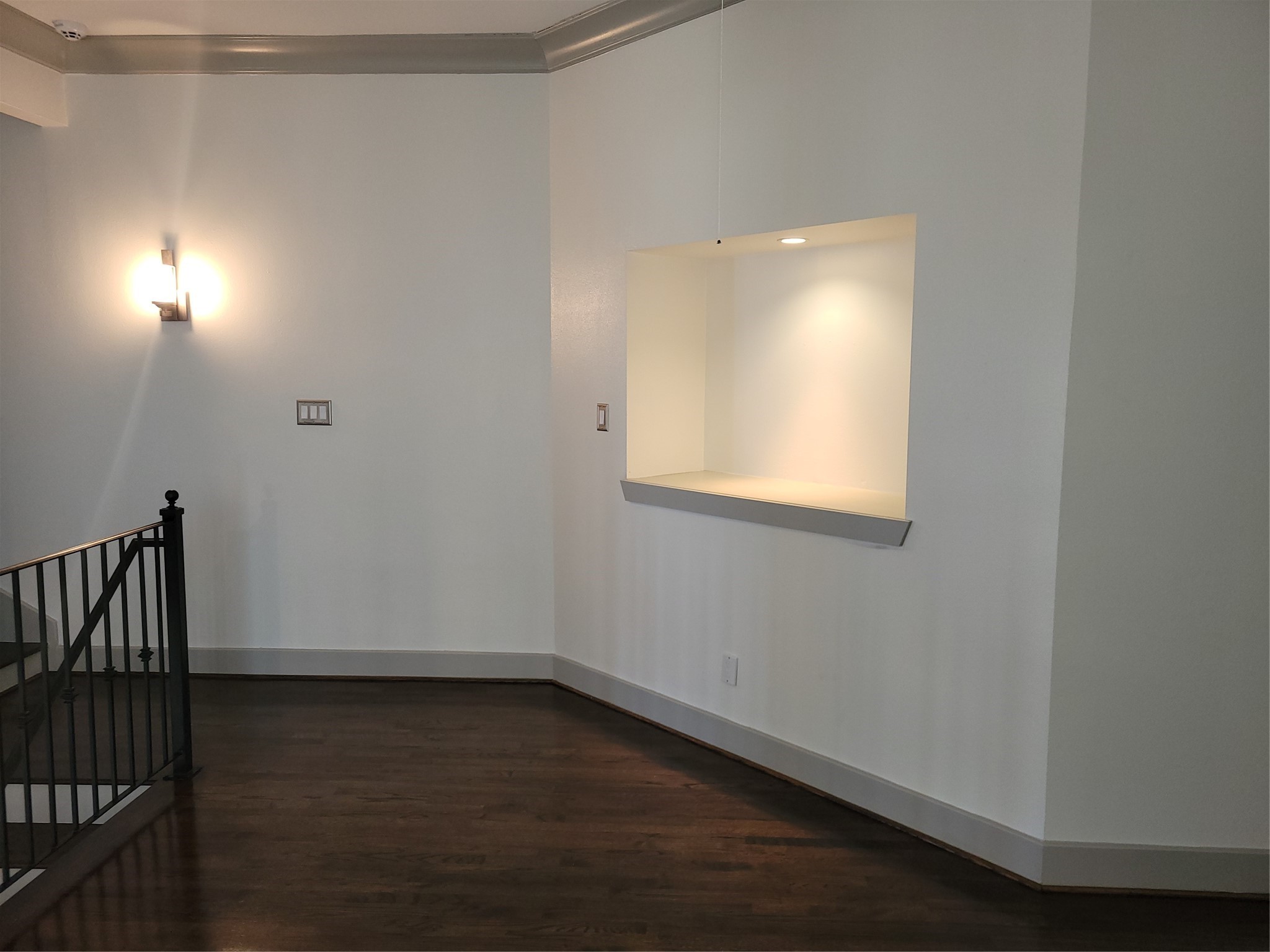 4914 Rose Street Houston, TX 77007 - Photo 17 of 36 a view of an empty room with wooden floor and a window