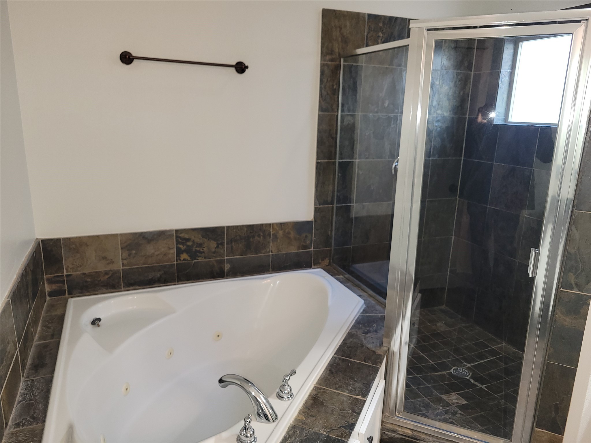 4914 Rose Street Houston, TX 77007 - Photo 24 of 36 a bathroom with a bathtub and a shower