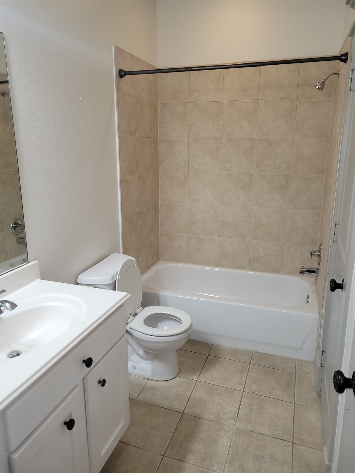 4914 Rose Street Houston, TX 77007 - Photo 26 of 36 a bathroom with a sink a toilet and a bathtub