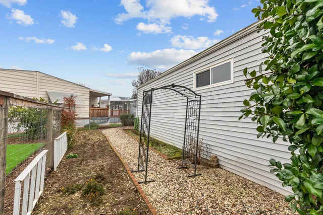 a view of a studio with wooden floor