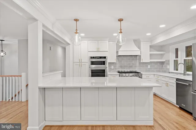 a large kitchen with cabinets