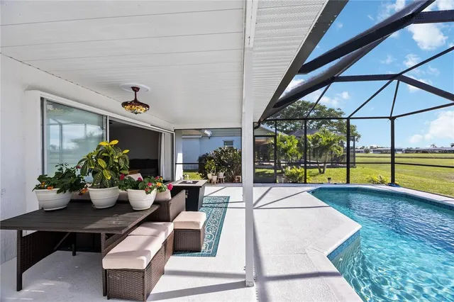 an aerial view of a houses with outdoor space