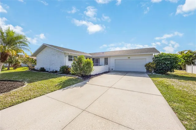 an aerial view of a building with outdoor space ocean view