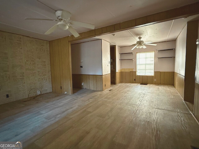 138 Deacon J Simmons Road Southwest Milledgeville, GA 31061 - Photo 9 of 11 a view of empty room with wooden floor and fan