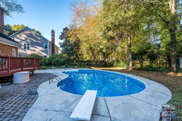 a view of a house with swimming pool