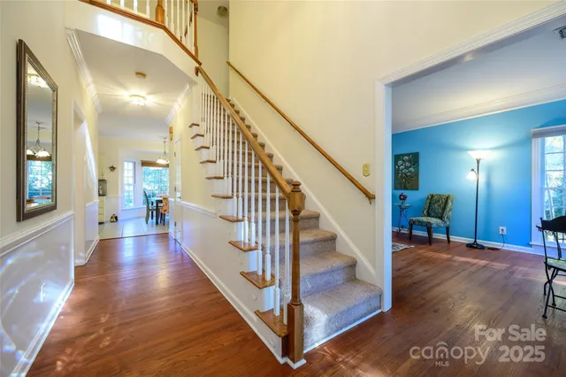 a view of a hallway view with staircase