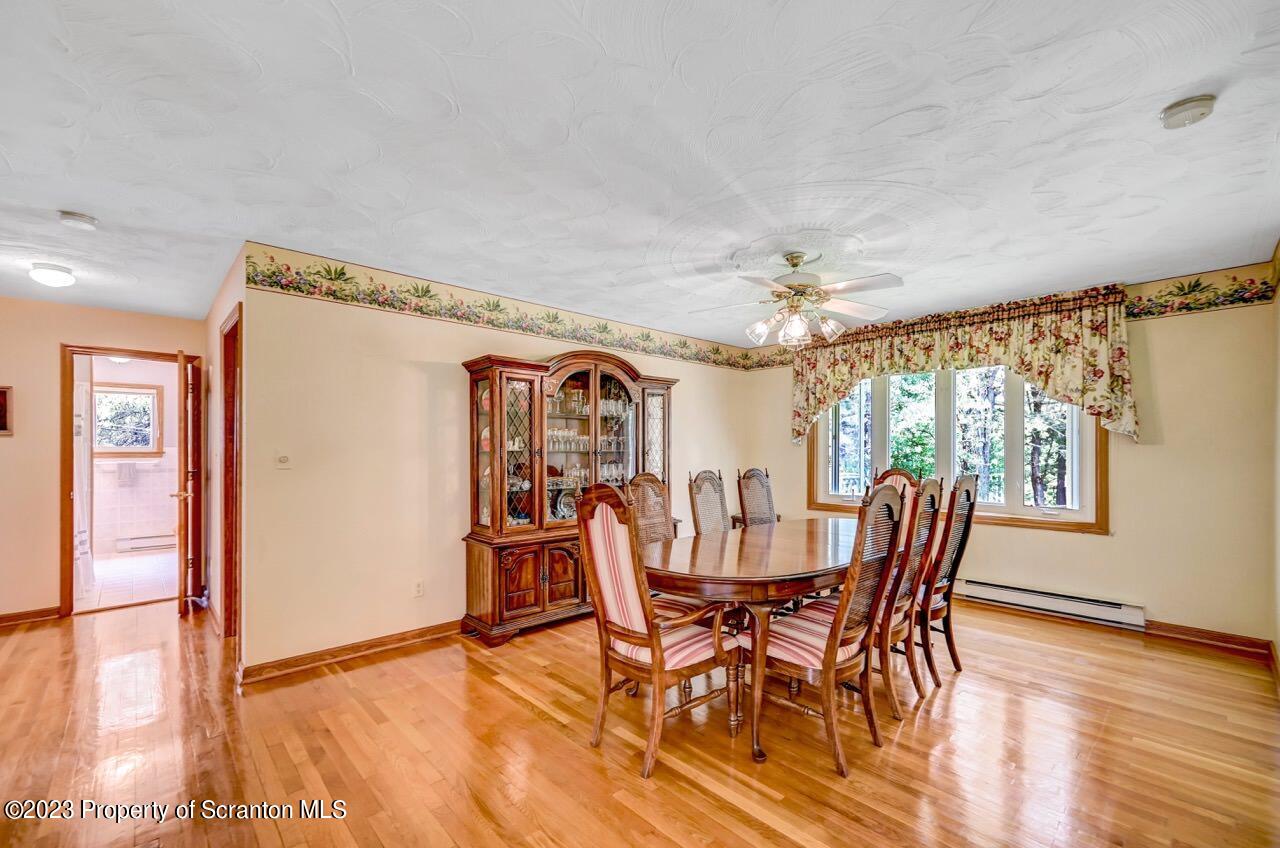 3 T-338 Moscow, PA 18444 - Photo 14 of 62 a view of a dining room with furniture window and wooden floor