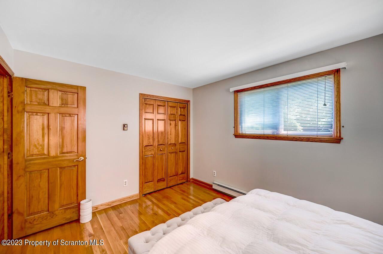 3 T-338 Moscow, PA 18444 - Photo 34 of 62 a bedroom with a bed and a window